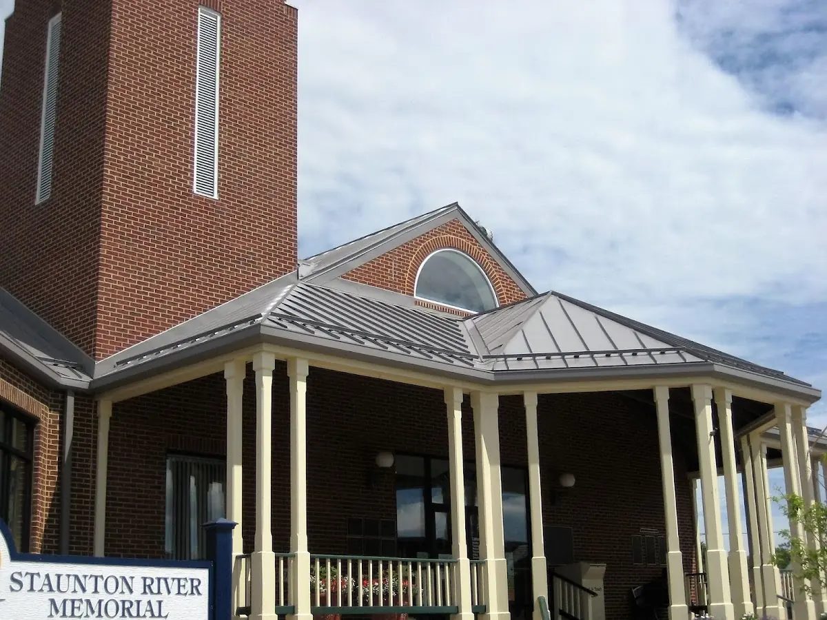 Skilled roofing craftsmen working on a residential roof in Old Myrtle